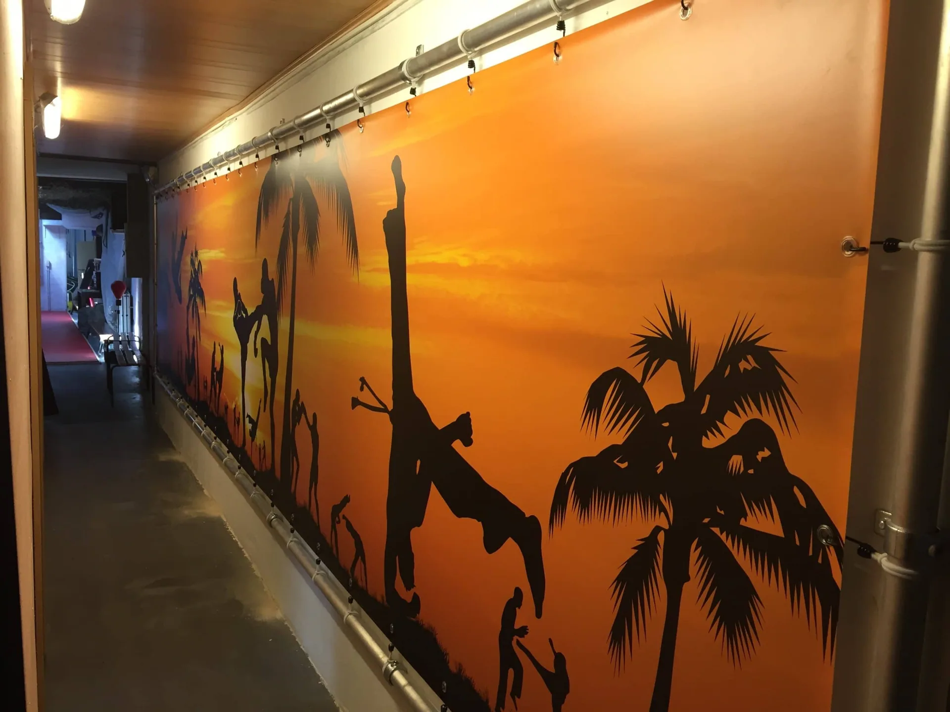 Large format print is taken out of a printer